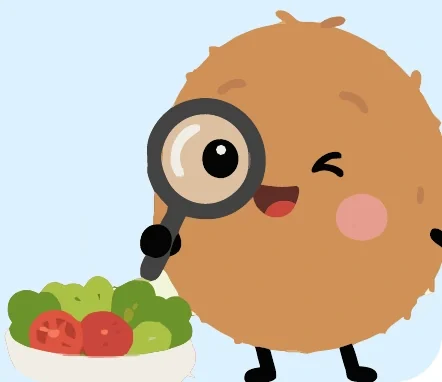 GoCoCo’s mascot exploring a bowl of vegetables