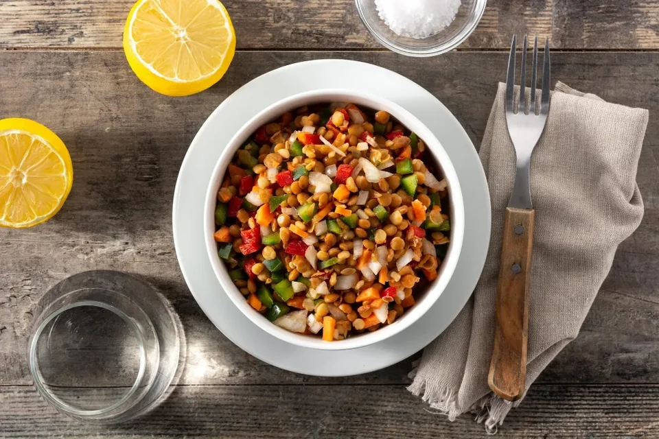 Lentil salad with peppersonion and carrot in bowl