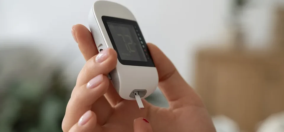 Diabetic person checking their glucose level